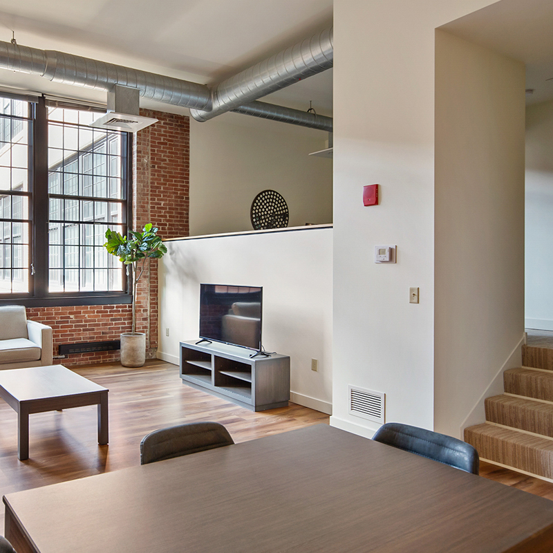 Modern apartment with lofted ceilings with industrial ventilation